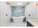 Spa-like bathroom with a freestanding tub and a walk-in shower at 6514 Quarter Horse Ln, Orlando, FL 32818