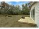 Wooden deck with fire pit overlooking the backyard at 6514 Quarter Horse Ln, Orlando, FL 32818