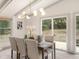 Modern farmhouse dining room with wood table and chairs at 6514 Quarter Horse Ln, Orlando, FL 32818