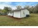 Side view of the house, showing the AC unit at 6514 Quarter Horse Ln, Orlando, FL 32818