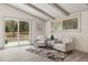 Bright living room with sliding glass doors leading to a deck at 6514 Quarter Horse Ln, Orlando, FL 32818