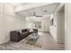 Living room with gray sectional sofa and modern decor at 6514 Quarter Horse Ln, Orlando, FL 32818