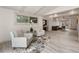 Living room with gray sectional sofa and modern decor at 6514 Quarter Horse Ln, Orlando, FL 32818