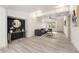 Living room with gray sectional sofa and modern decor at 6514 Quarter Horse Ln, Orlando, FL 32818