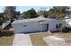 Aerial view of a house with a paved walkway at 660 Encino Way, Altamonte Springs, FL 32714