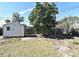 Large backyard with shed and partially fenced area at 660 Encino Way, Altamonte Springs, FL 32714