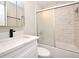 Updated bathroom with a tub and marble tile shower at 660 Encino Way, Altamonte Springs, FL 32714