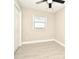 Bright bedroom with tile floors, a closet, and a window at 660 Encino Way, Altamonte Springs, FL 32714