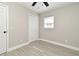 Bedroom with tile floors, ceiling fan and double closet at 660 Encino Way, Altamonte Springs, FL 32714