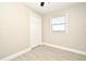 Well-lit bedroom featuring tile floors and a double-door closet at 660 Encino Way, Altamonte Springs, FL 32714