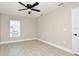 Well-lit bedroom with ceiling fan and tile flooring at 660 Encino Way, Altamonte Springs, FL 32714