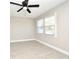 Well-lit bedroom featuring tile floors and a ceiling fan at 660 Encino Way, Altamonte Springs, FL 32714