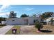 Front of house, showing walkway and landscaping at 660 Encino Way, Altamonte Springs, FL 32714