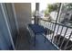 Private screened balcony with table and chairs at 7123 Yacht Basin Ave # 3, Orlando, FL 32835