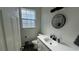 Bright bathroom includes a modern vanity, sleek sink, and ample natural light, offering a fresh, clean space at 7123 Yacht Basin Ave # 3, Orlando, FL 32835