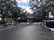 Gated community entrance with security at 7123 Yacht Basin Ave # 3, Orlando, FL 32835