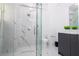 Modern bathroom with marble shower and sleek vanity at 717 Eastlawn Dr, Kissimmee, FL 34747