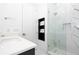 Clean bathroom with walk-in shower and modern vanity at 717 Eastlawn Dr, Kissimmee, FL 34747