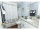 Bathroom with tub, granite vanity and white cabinets at 748 N Gretna Ct, Winter Springs, FL 32708