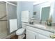 Bathroom with shower, granite vanity, and tile floor at 748 N Gretna Ct, Winter Springs, FL 32708