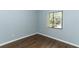 Bedroom with wood floors and window at 748 N Gretna Ct, Winter Springs, FL 32708