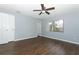 Spacious bedroom with wood-look floors and double doors at 748 N Gretna Ct, Winter Springs, FL 32708