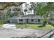 Updated single-story home with a large front yard and driveway at 748 N Gretna Ct, Winter Springs, FL 32708