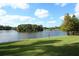 Scenic view of a tranquil lake with lush greenery at 748 N Gretna Ct, Winter Springs, FL 32708