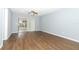 Living room featuring wood-look floors and sliding glass doors at 748 N Gretna Ct, Winter Springs, FL 32708