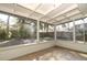 Screened porch with view of fenced backyard at 748 N Gretna Ct, Winter Springs, FL 32708