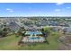 Community pool and surrounding homes from above at 764 Sarner Pass Way, Winter Haven, FL 33881