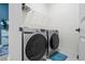 Convenient laundry room with washer and dryer at 764 Sarner Pass Way, Winter Haven, FL 33881