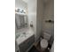 Clean and updated bathroom with gray vanity and mirror at 820 W 25Th St, Sanford, FL 32771