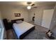 Spacious bedroom with a double bed, mirrored closet, and guitar at 820 W 25Th St, Sanford, FL 32771