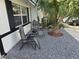 Relaxing front patio with gravel and comfortable seating at 820 W 25Th St, Sanford, FL 32771