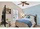 Bedroom with a double bed, ceiling fan and window shutters at 900 Khingan Ct, Apopka, FL 32712