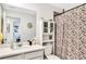 Clean bathroom with a shower/tub combo, a vanity with a large mirror and toilet at 914 Spring Palms Loop, Orlando, FL 32828