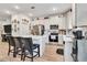 Modern kitchen with stainless steel appliances and white cabinetry at 914 Spring Palms Loop, Orlando, FL 32828