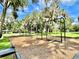 playground with swings and wood chips at 111 Millholland St, Oakland, FL 34760