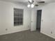 Bedroom with carpet flooring and ceiling fan at 113 W 1St St, Debary, FL 32713