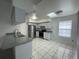 Kitchen with stainless steel appliances and grey countertops at 113 W 1St St, Debary, FL 32713