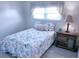 Bedroom with a full bed and wooden nightstand at 1401 W Highway 50 # 138, Clermont, FL 34711