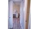 Bedroom with white wicker furniture and wood-look flooring at 1401 W Highway 50 # 138, Clermont, FL 34711
