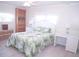 Bright bedroom with a comfortable bed, built-in shelves, and ample storage at 1401 W Highway 50 # 138, Clermont, FL 34711