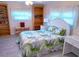 Bedroom with a full bed, built in shelves, and light flooring at 1401 W Highway 50 # 138, Clermont, FL 34711