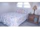 Bedroom with a full bed and wooden nightstand at 1401 W Highway 50 # 138, Clermont, FL 34711