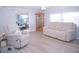 Living room with beige recliner, sofa, and wood flooring at 1401 W Highway 50 # 138, Clermont, FL 34711