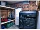 Well-equipped workshop featuring a large tool chest and shelving at 1401 W Highway 50 # 138, Clermont, FL 34711