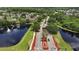 Aerial view of community entrance and lake at 14783 Yorkshire Run Dr, Orlando, FL 32828