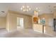 Open dining area with kitchen views and access to other rooms at 14783 Yorkshire Run Dr, Orlando, FL 32828